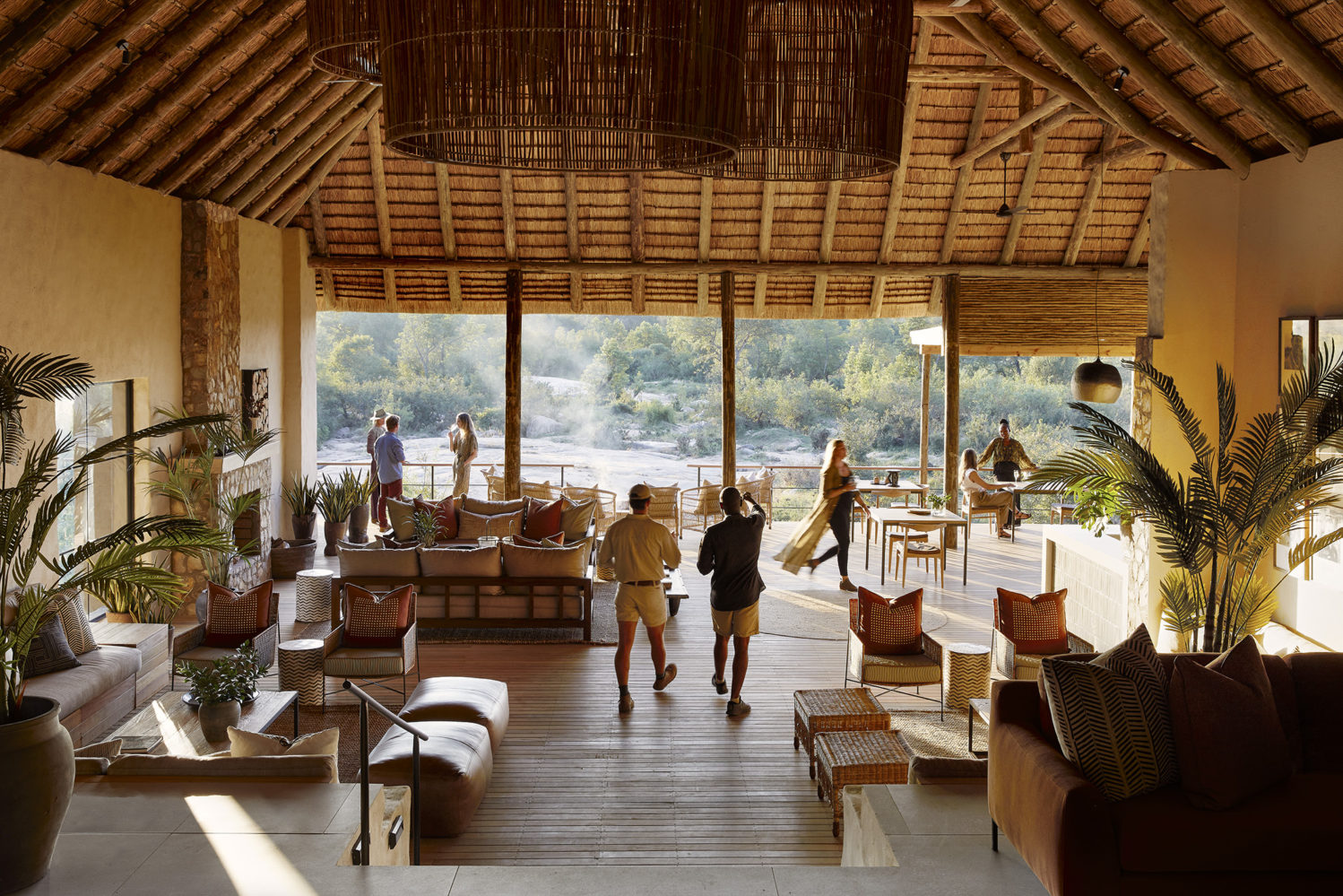 Londolozi Founders Camp Main Area Lounge and View of the Sand River at Sunset Campfire | Boyd Varty